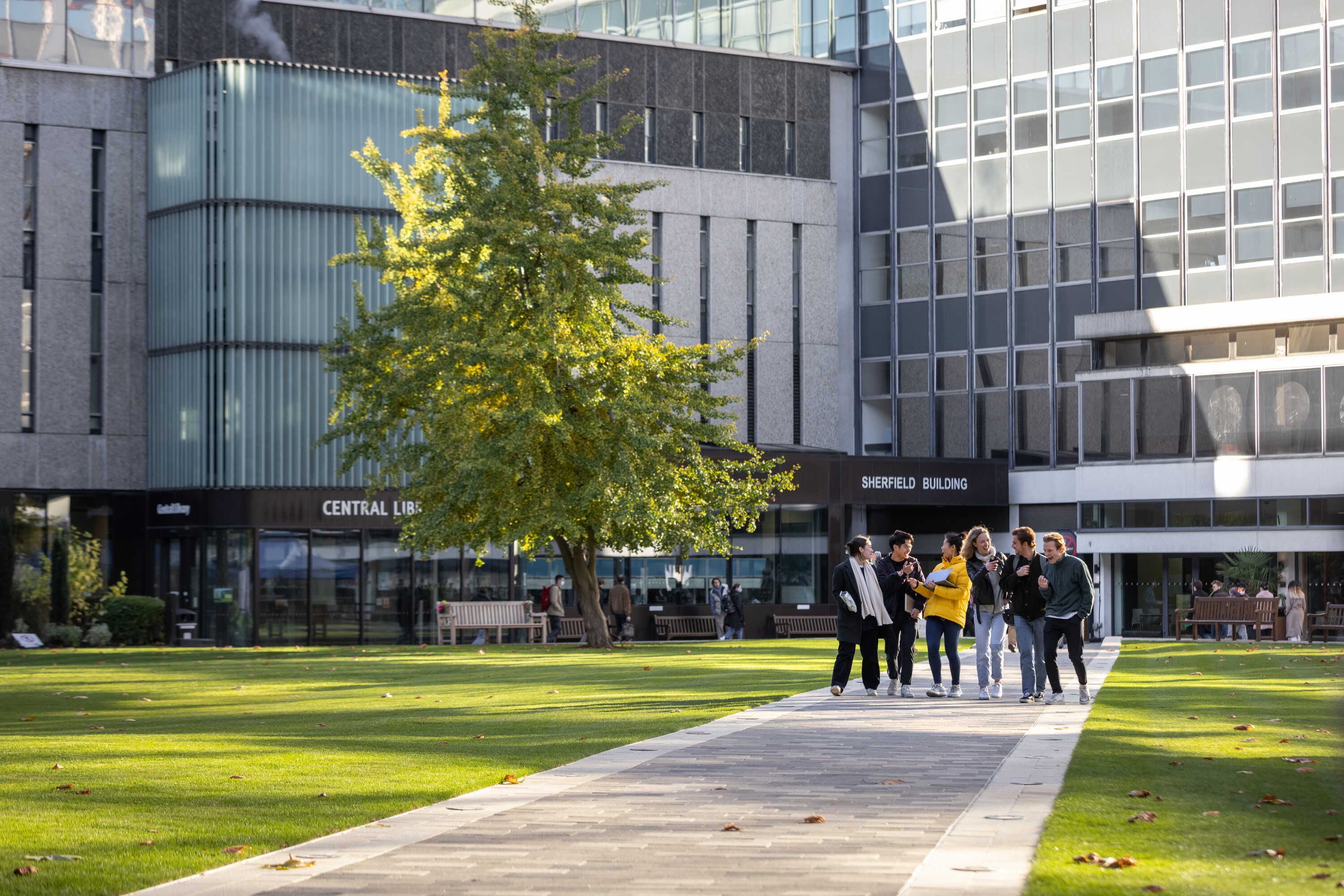 Students walking across Dangoor Plaza at Impeiral's South Kensington Campus