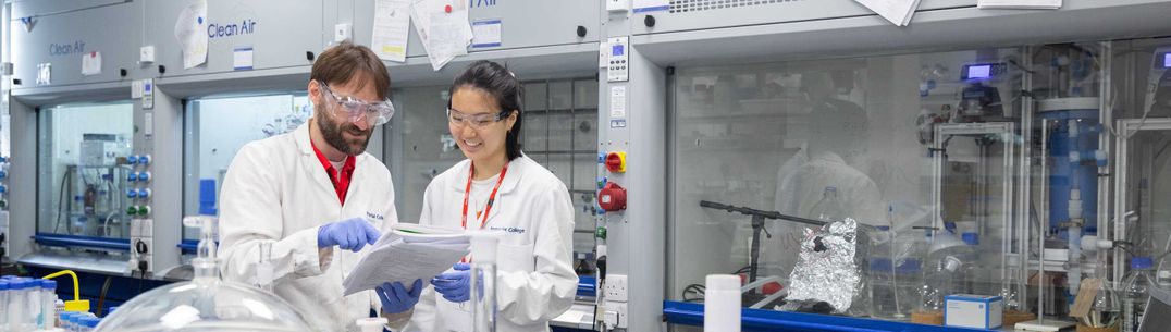 Chemical Engineering student in lab smiling