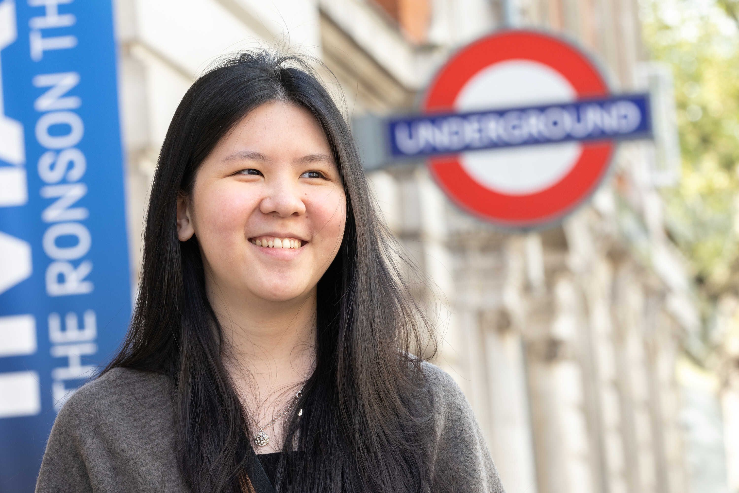 Student outside London underground station
